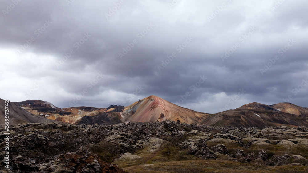 Brennisteinsalda in a Lava Field With Stormclouds
