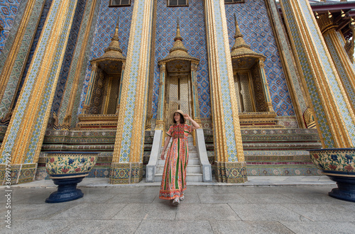 Asian women tourist traveling at Wat Phra Kaew or Wat Phra Si Rattana Satsadaram or Temple of the Emerald Buddha, Bangkok, Thailand, Traveler and Journey trip concept © surachetkhamsuk
