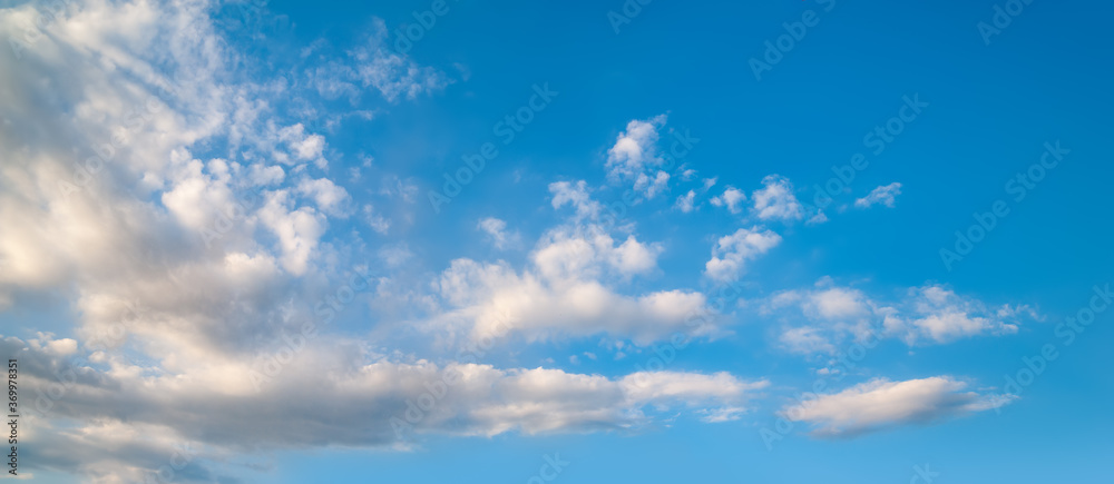 Cloudy sky. Panorama of blue sky with clouds. Natural landscape background. Cloudy sky. Panorama of blue sky with clouds. Natural landscape background.