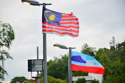 Malaysia flag waving in Kota Kinabalu, Malaysia photo