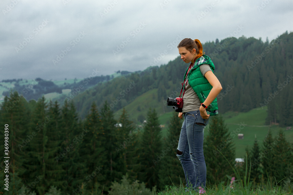 photographer in Ukraine Carpathians shoots a landscape