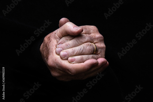 A pair of clasped old hands photo