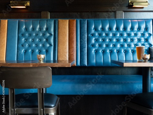 Luxurious and timeless leather booths in a restaurant. photo