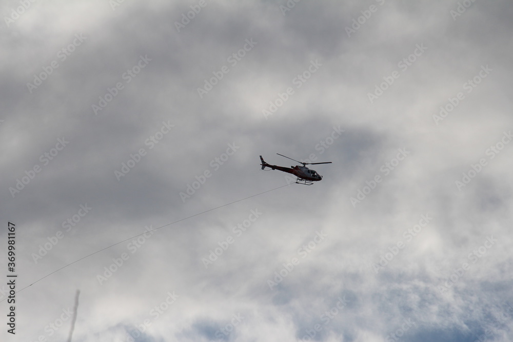 Fototapeta premium helicopter flying in the sky
