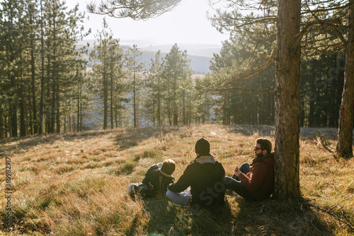 Young hikers having a lunch break
