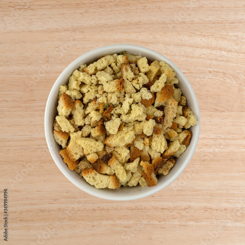 Bowl of stovetop stuffing on a wood table