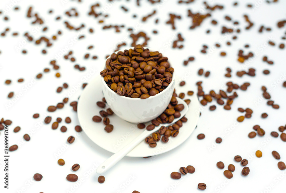 white coffee Cup and coffee beans on a white background, the concept of cheerfulness white coffee Cup and coffee beans on a white background, the concept of cheerfulness