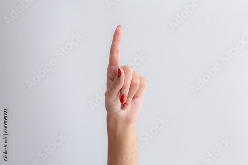 female hand showing ok sign