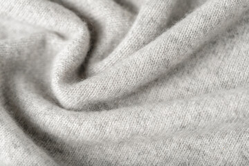 Light grey luxury natural cashmere texture as background
