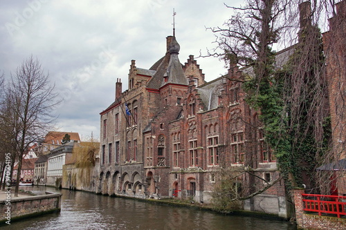 Historic buildings viewed from the Dijver Canal in the medieval city of Bruges  Belgium