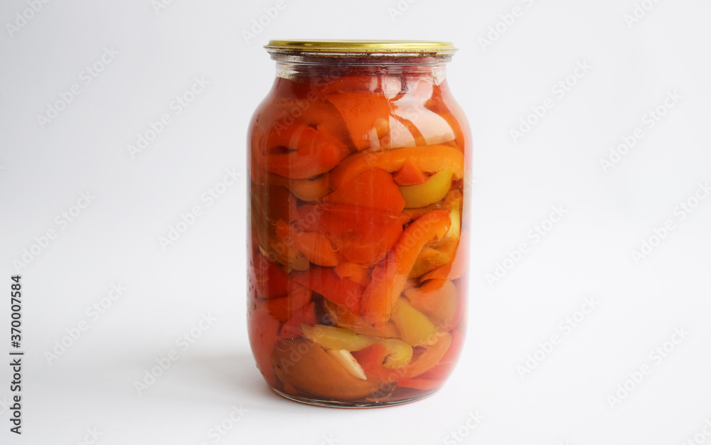 glass jar of canned vegetables. various vegetables, peppers, onions, carrots, tomatoes. Lecho, vegetable salad. Isolate on white background glass jar of canned vegetables. various vegetables, peppers, onions, carrots, tomatoes. Lecho, vegetable salad. Isolate on white background