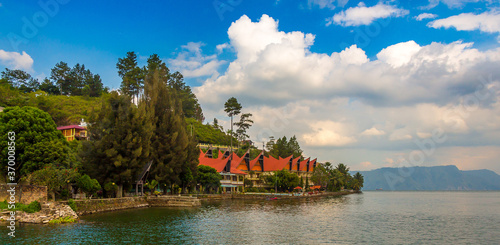 Vászonkép A Bataknese style resort on the shores of Danau Lake Toba, Sumatra, Indonesia