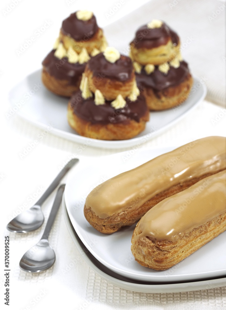 FRENCH CAKES CALLED CHOCOLATE RELIGIEUSE AND COFFE ECLAIR FRENCH CAKES CALLED CHOCOLATE RELIGIEUSE AND COFFE ECLAIR