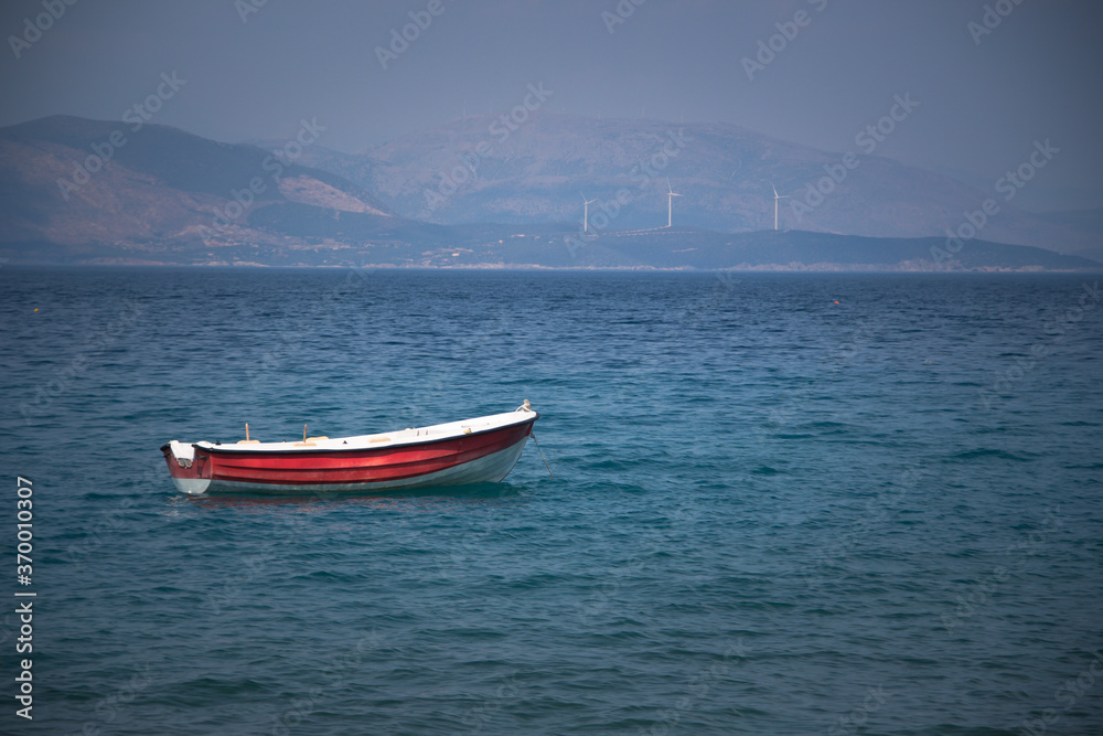 Red and White Boat on Sea
