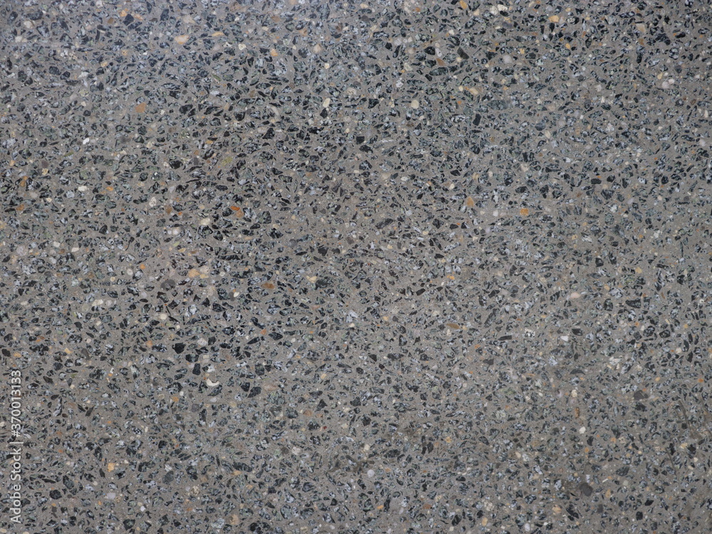 Gray polished concrete interspersed with fine stone Gray polished concrete interspersed with fine stone