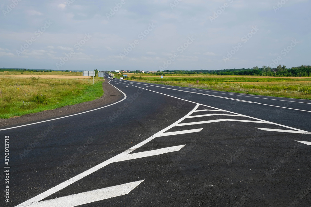 New road. Road markings. Fresh paint. Copy space. New road. Road markings. Fresh paint. Copy space.