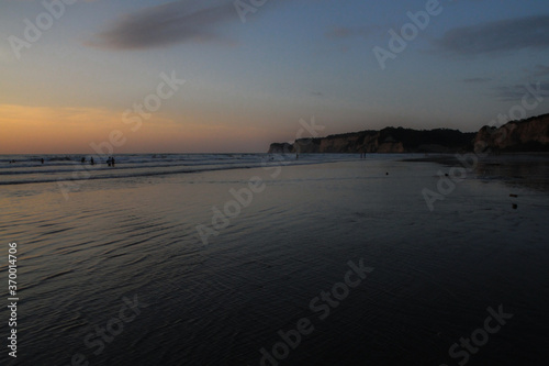 Sunset at beautiful beach at Canoa, pacific coast, Puerto Lopez, Manatí, Ecuador