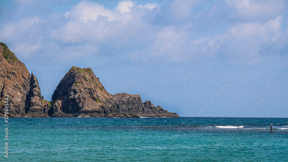 The rocky shoreline at Mawun Bay, near Kuta Lombok, Indonesia The rocky shoreline at Mawun Bay, near Kuta Lombok, Indonesia