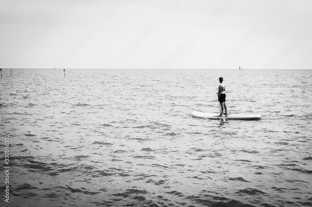 Naklejka premium man on the beach