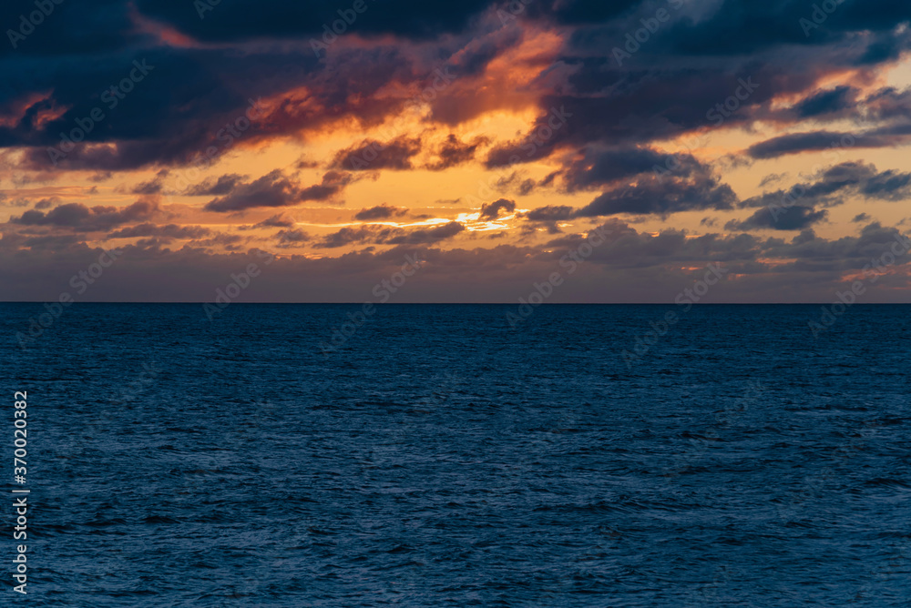 sunset on the cliffs On the arch of Anguilla island in the Caribbean sea