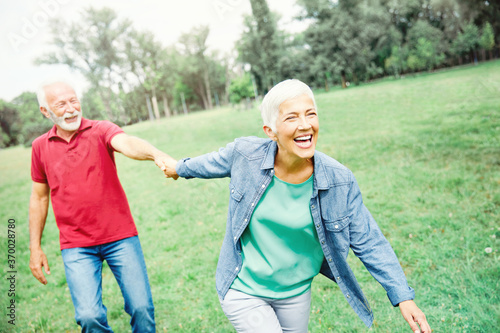 senior couple happy elderly love together retirement lifestyle smiling man woman mature fun © Lumos sp