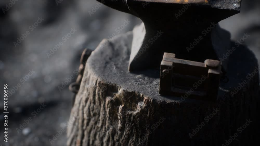 Old anvil attached to a stump Old anvil attached to a stump