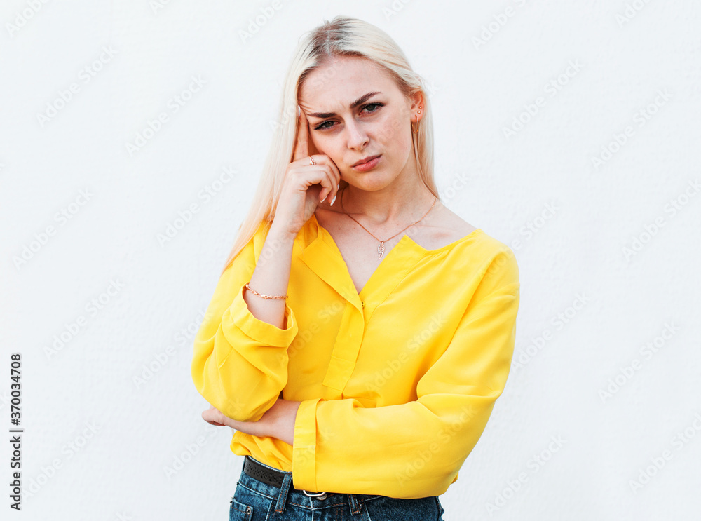Angry young woman on white background Angry young woman on white background