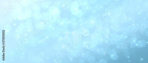 shiny abstract festive blue star background with bokeh effect.