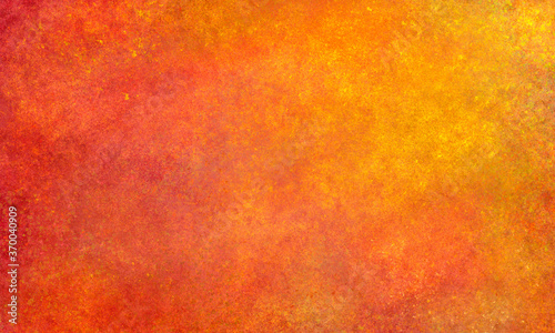 abstract grunge bright orange background with blots and spots