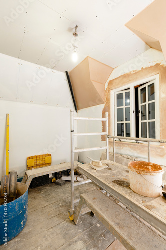 Gypsum plasterboard drywall installation in UK home interior photo
