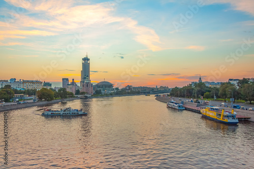 View of the Krasnokholmskaya and the Kosmodamianskaya embankments from the Novospassky bridge in summer evening at sunset