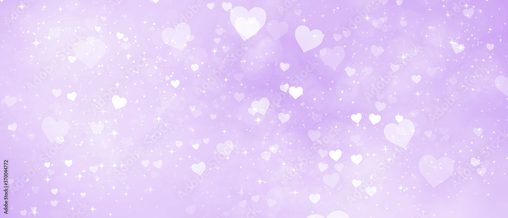 romantic shiny bright purple background with hearts and bokeh effect
