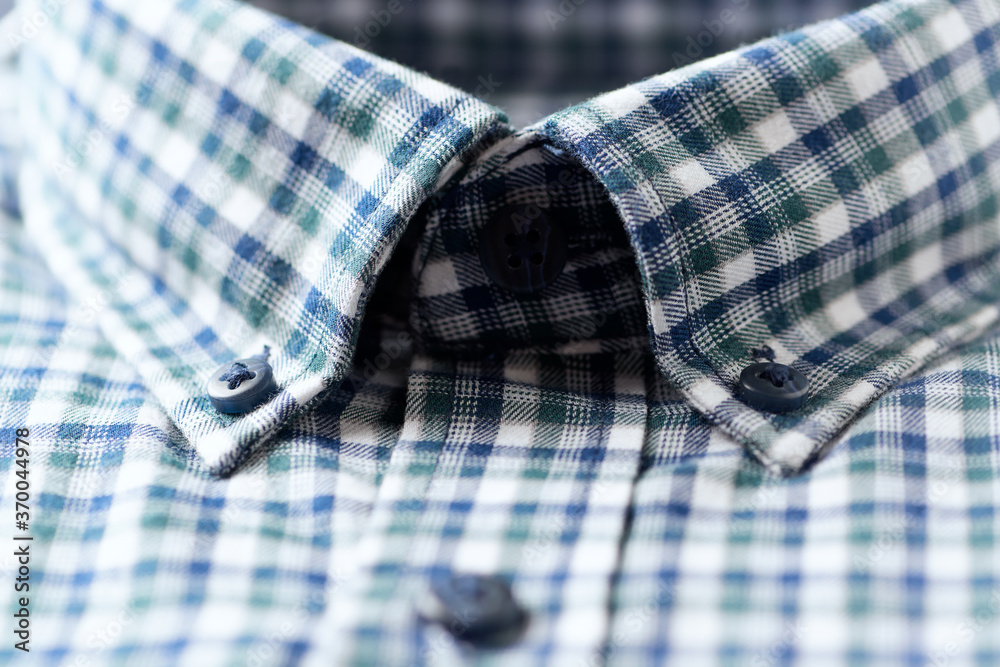 Close up of Men's checkered shirt. Close up of Men's checkered shirt.