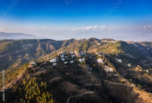Aerial view of the historical site - Namo Buddha, where Buddha Shakyamuni, being in a previous incarnation, sacrificed himself for the sake of hungry of tigress cubs. Himalayan range on horizon, also  photo