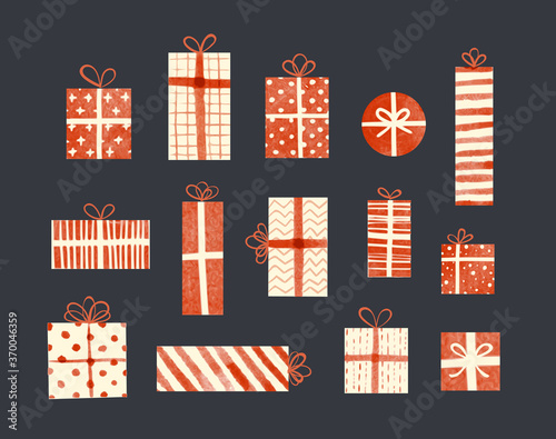 Set of cream-colored and red gift boxes in vintage style on dark background.