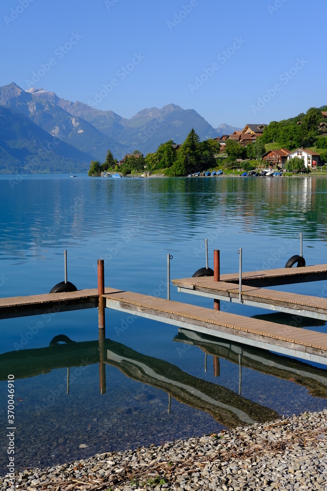 Swiss alpine lake and jetty, Oberreid, Brienzersee, Switzerland Swiss alpine lake and jetty, Oberreid, Brienzersee, Switzerland