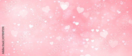 pink romantic delicate light pink background with hearts and bokeh effect