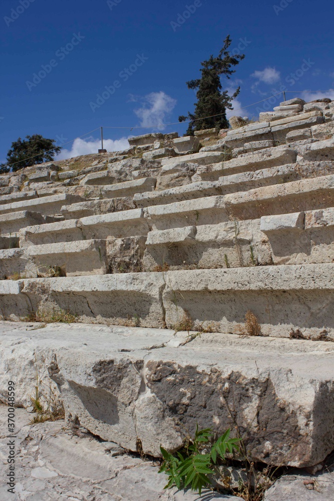 Architectural close up of the stone steps of the Theatre of Dionysus ruin in Athens, Greece