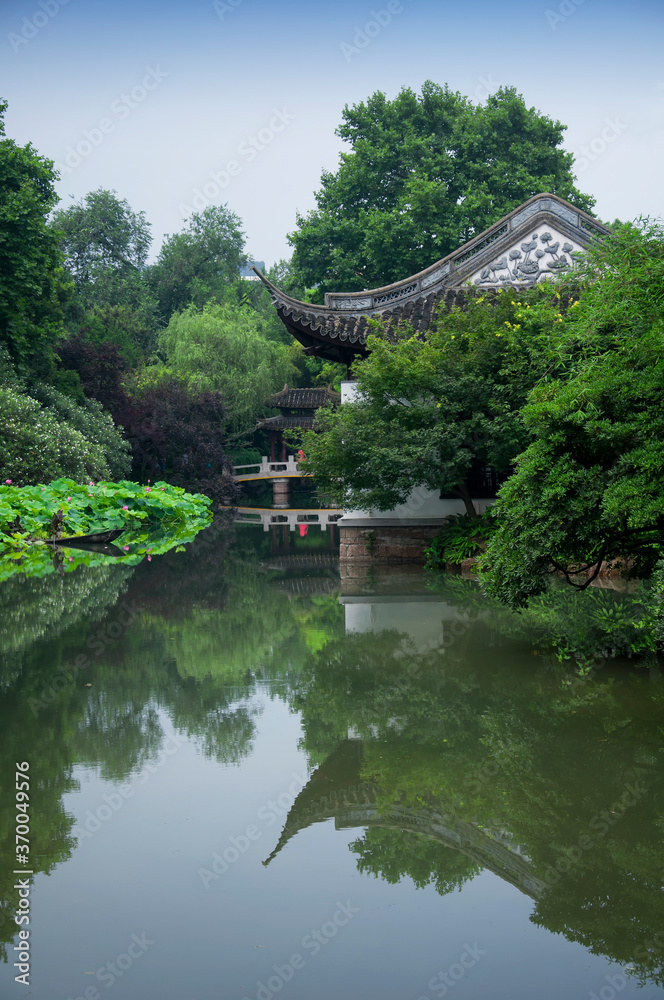 a traditional chinese building on a pond in guyi gardens shanghai china a traditional chinese building on a pond in guyi gardens shanghai china
