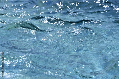 Blue sea clear water with waves background © moreidea