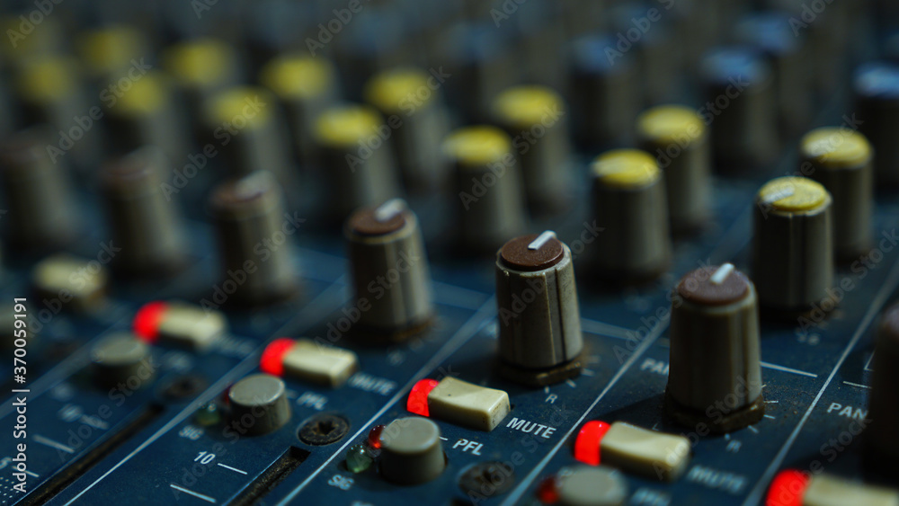 Audio sound mixer with mute button and fader knobs Audio sound mixer with mute button and fader knobs