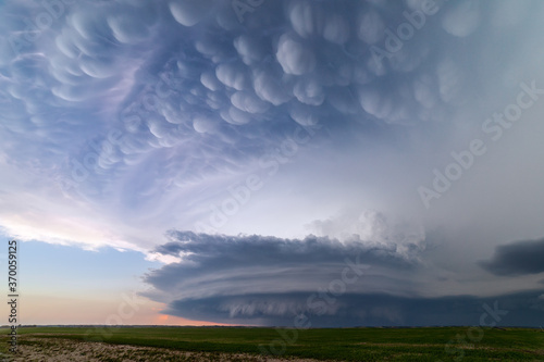 Supercell thunderstorm with mammatus clouds photo
