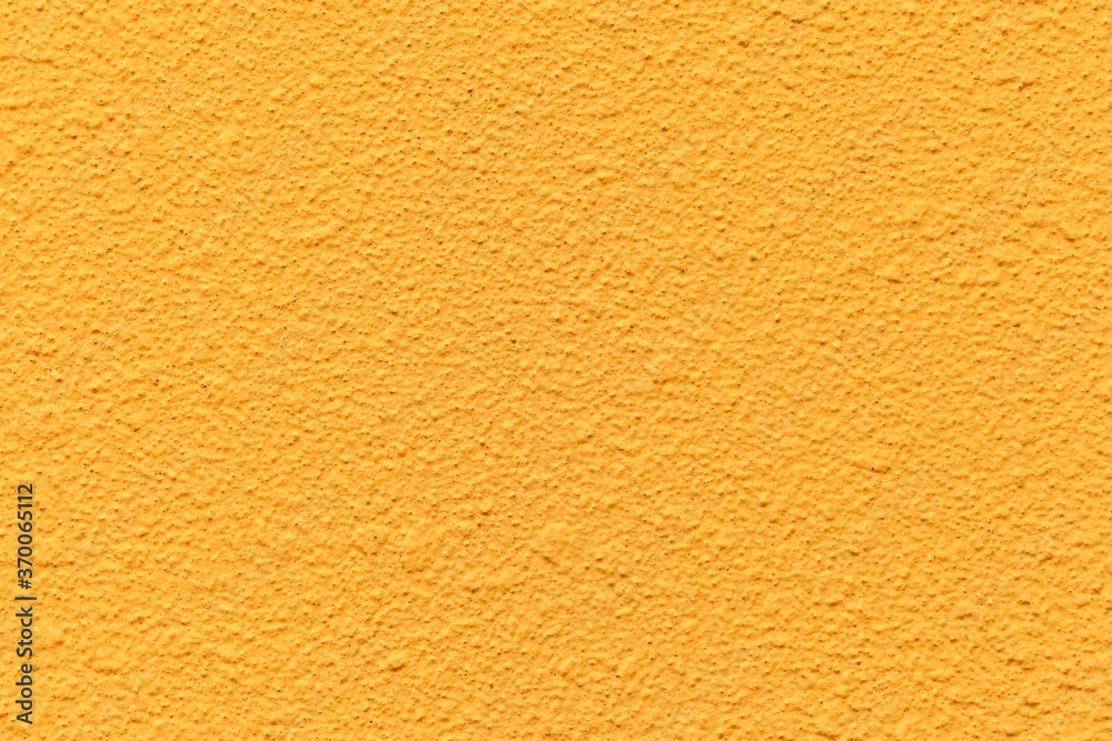 Fototapeta premium Patterned cement wall Vintage yellow painted texture and background