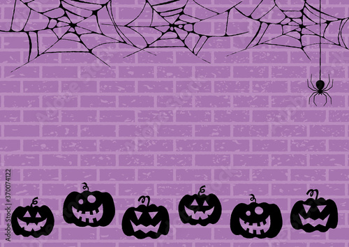 蜘蛛の巣とカボチャのハロウィンの背景