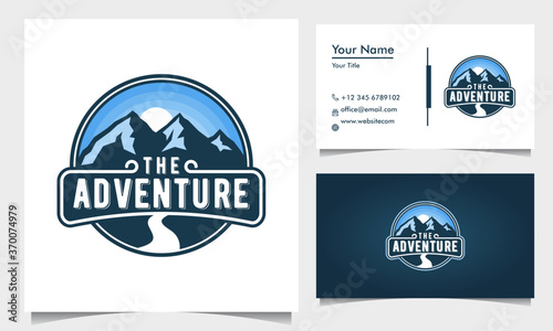 badge adventure logo design with blue mountains and road and sunrise, with business card template