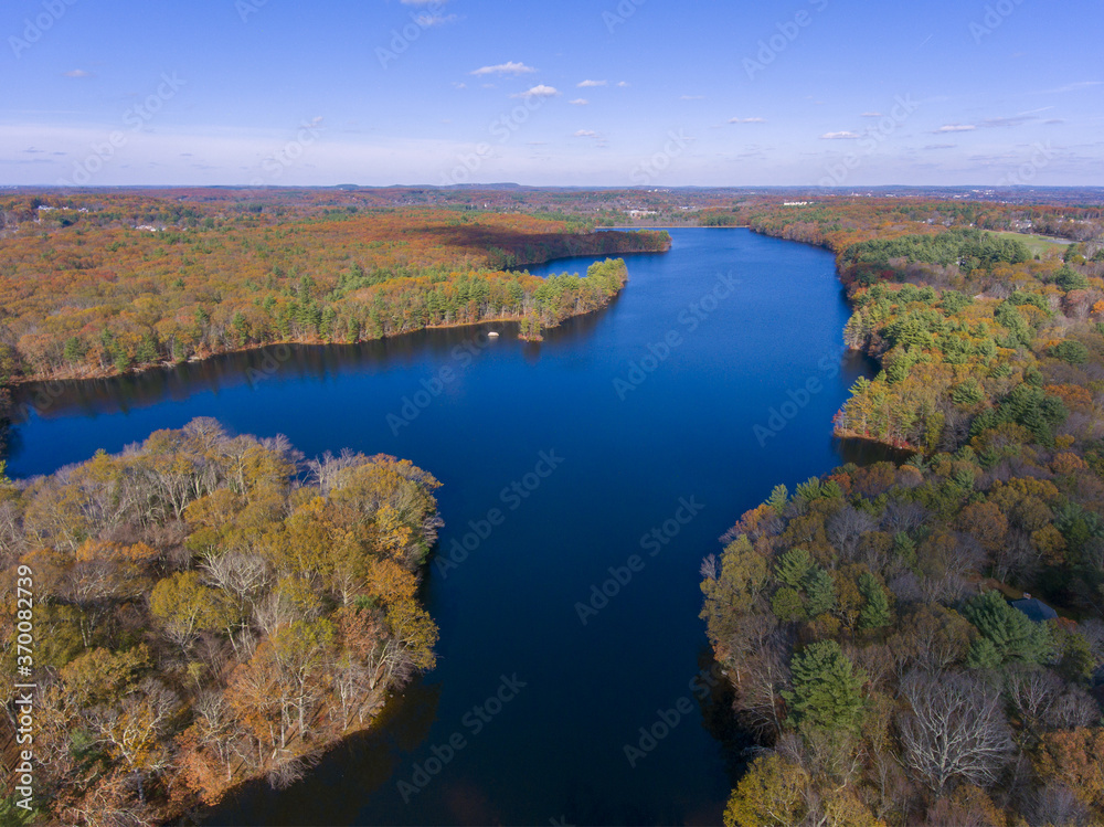 Fototapeta premium Ashland Reservoir aerial view with fall foliage in Ashland State Park in town of Ashland, Massachusetts MA, USA. 