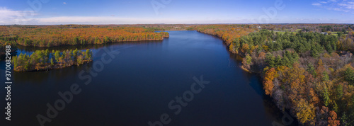 Ashland Reservoir aerial view panorama with fall foliage in Ashland State Park in town of Ashland, Massachusetts MA, USA. 