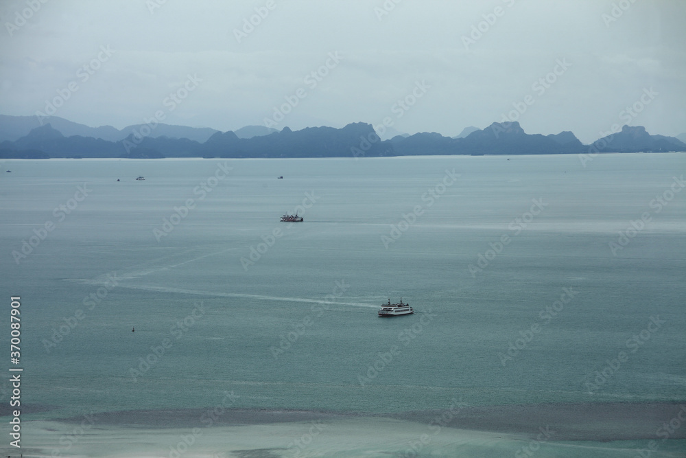 Fototapeta premium Car ferrys out at sea - close to Nathon Pier and Port - Koh Samui - Thailand