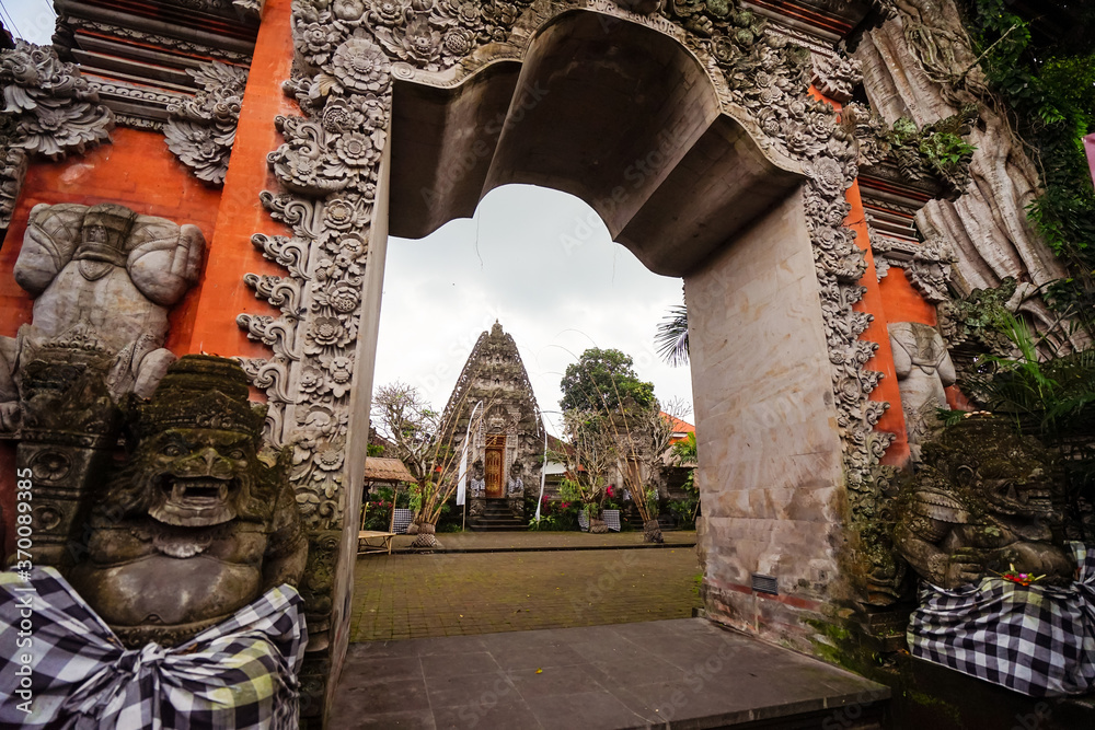 Buddhist temple seen through entrance arch