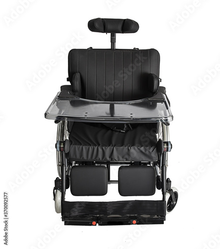 Black electric wheelchair with tray table on a white background.